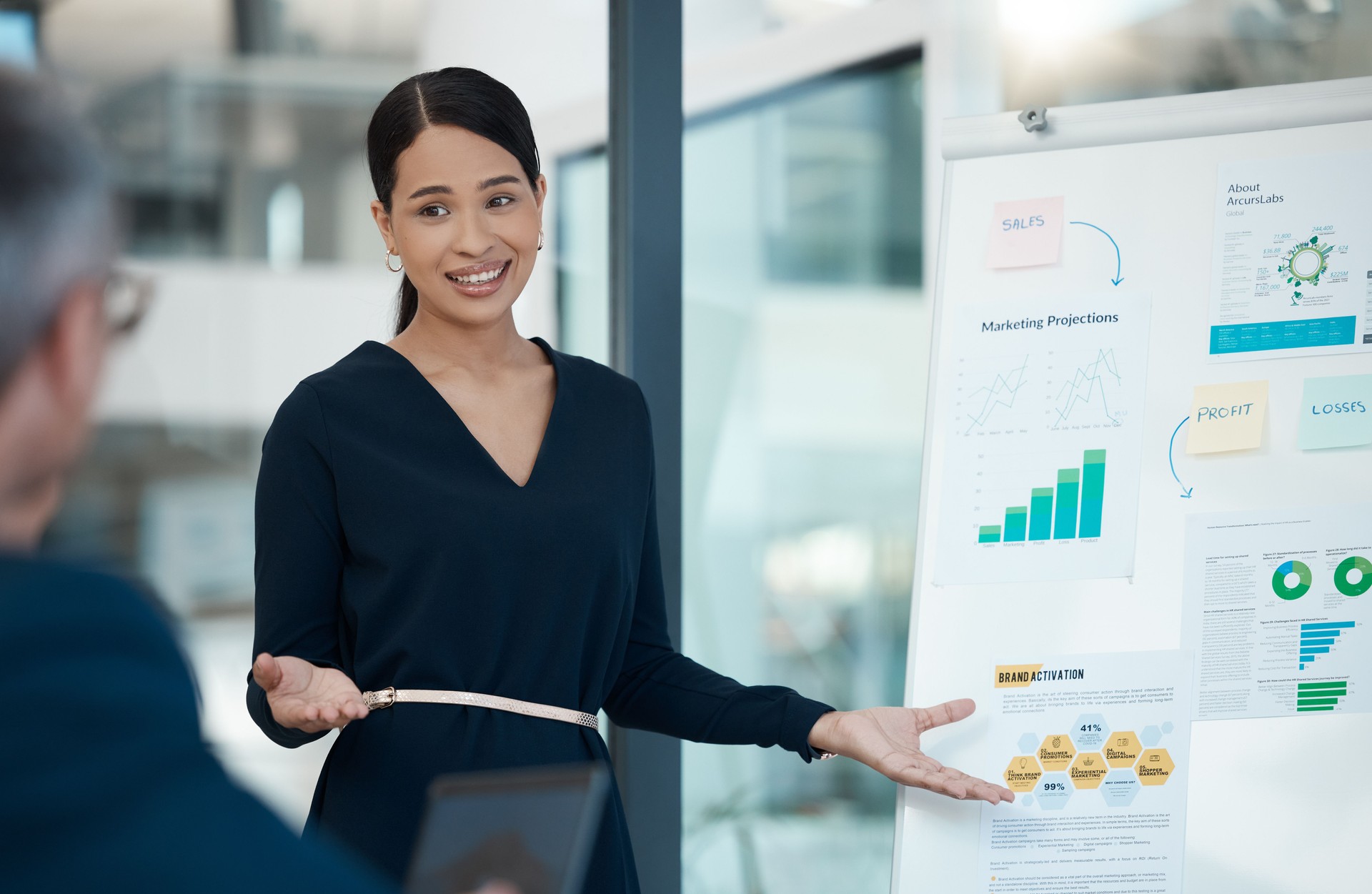 Business meeting, presenter and accounting presentation with data, graphs and charts in office. Financial strategy, economy analysis and woman accountant talking at team seminar in conference room.